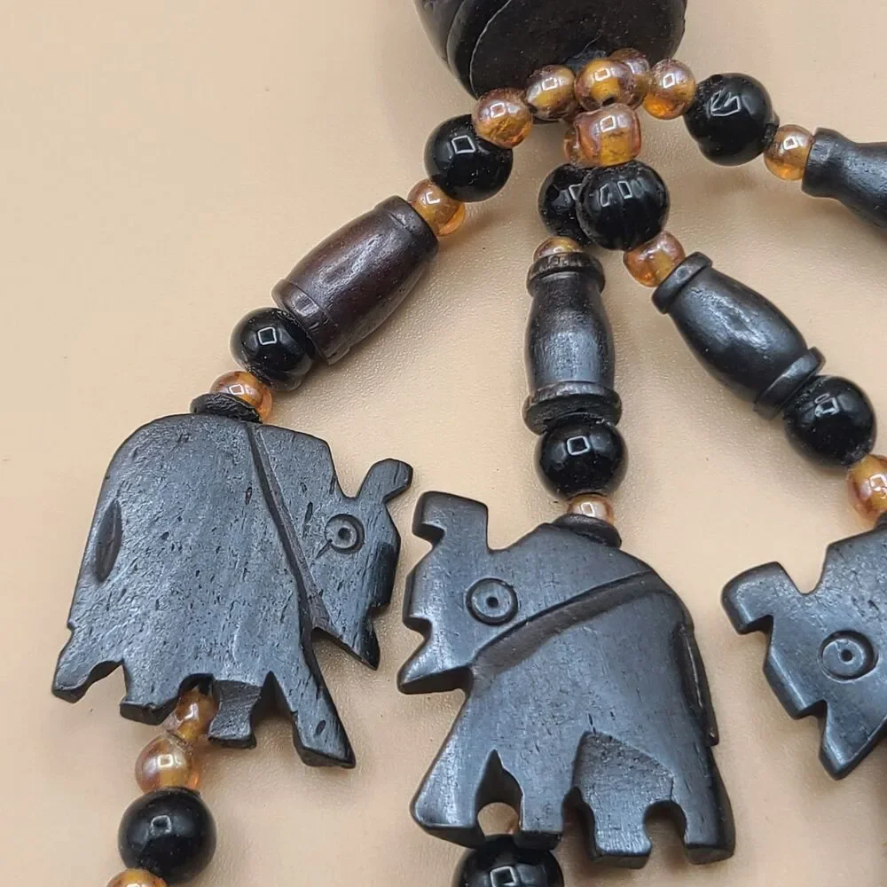 Vtg Pier 1 Imports Hand Carved Wood Beaded Elephant Napkin Rings Set of 7